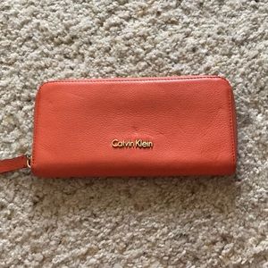 Orange Calvin Klein wallet